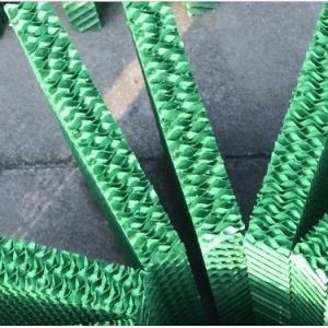Evaporative cooling pad for livestock ventilation system